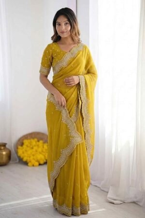 Celebrate timeless Indian tradition with this beautiful mustard yellow Bandhani print saree